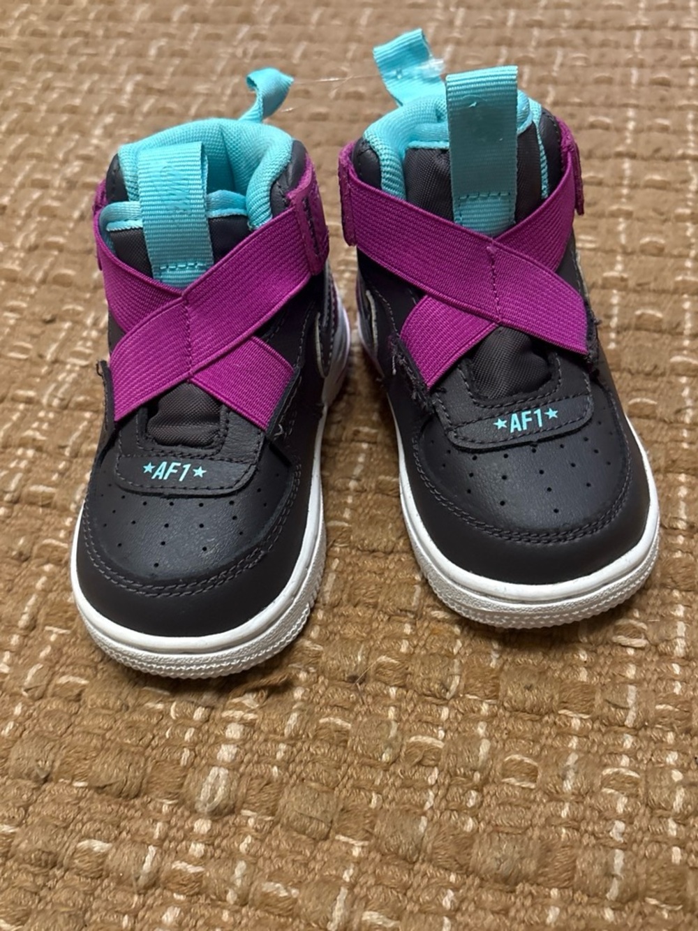 Kids Black Sneakers with Purple Crisscross Straps and Teal Accents